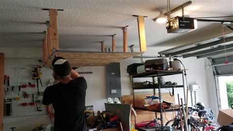 This can be tricky as it has to be mounted on top of. DIY Garage Ceiling Storage - YouTube