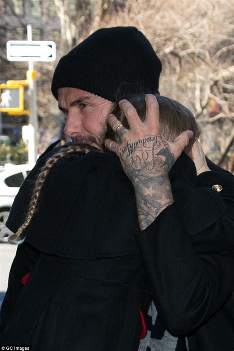 Beckham's foot and ankle tattoos. David Beckham shows off new tattoo on wedding ring finger ...