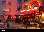 Pavement cafe at night on the corner of Rue de Seine Rue de Buci St ...