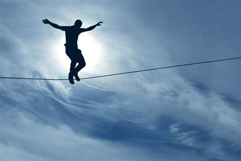 Concept Of Risk Taking Man Balancing On The Rope Stock Photo Image Of