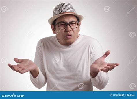 Asian Man Shrug Shoulder I Don X T Know Gesture Stock Photo Image Of Careless Mocking