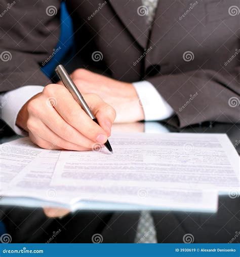 Businessman Writing On A Form Stock Image Image Of Finance