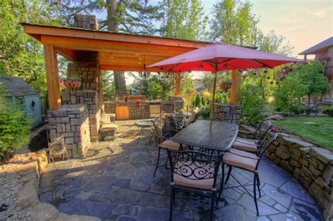 Amenities include a full outdoor kitchen, masonry wood burning this freestanding covered patio with an outdoor kitchen and fireplace is the perfect retreat! Outdoor living, gazebo, outdoor fireplace, water feature ...