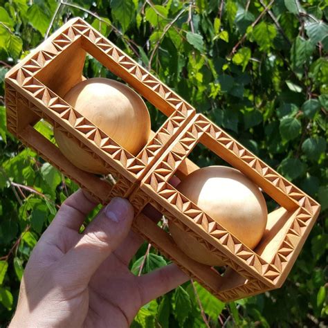 Two Balls In A Fancy Chip Carved Cage Hand Carved In Basswood