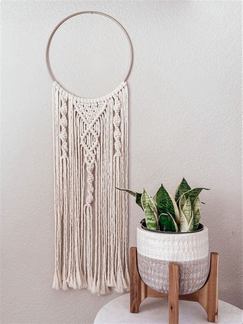 This bohemian wall hanging will add a bold statement to any space. Macrame Wall Hanging | Bohemian decor inspiration, Craft ...