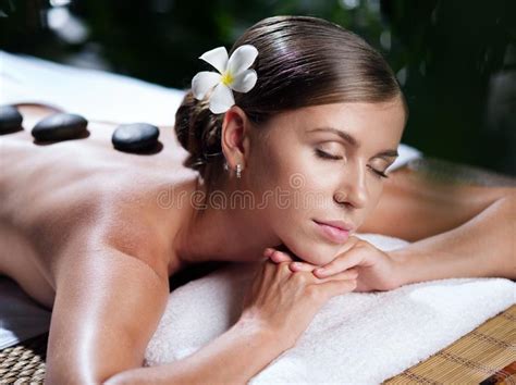 Stone massage stock image. Image of body, massaging, aromatherapy ...