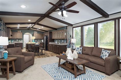 Triple wides, or three section homes, are floor plans that join three sections together to create a large, spacious home. Buccaneer_The-Burnett-2026DK_Liv-Kit_1082-1 - Hawks Homes ...