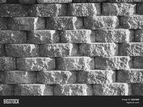 There is a 'break' in the machined area of the cross rib, right above the frog adjusting screw. Rugged split-face concrete block wal Stock Photo & Stock ...