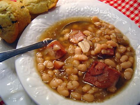 Navy beans are small legumes that are actually a light cream color. Crock Pot Ham And Beans Recipe - Genius Kitchen
