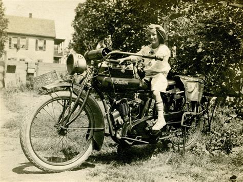Little Girl Sitting On An Indian Motorcycle With 1917 New