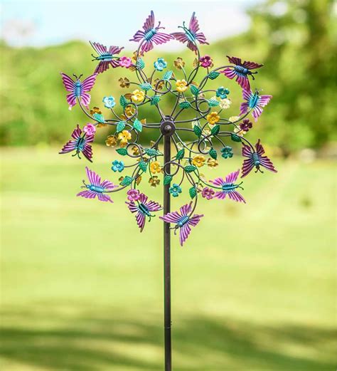 Place This Pink And Purple Butterfly Wind Spinner In Your Garden And