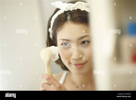 A Woman Washing Her Face Stock Photo Alamy