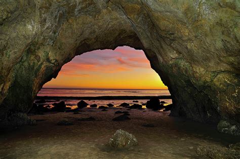 Dramatic Sunset Seen From Inside Cave Photograph By