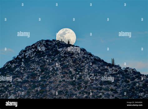 Full Moon Behind Hill In Desert At Sunset Los Frailes Baja California