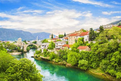 A Beautiful View Of The Old Bridge Across The Neretva River In Mostar