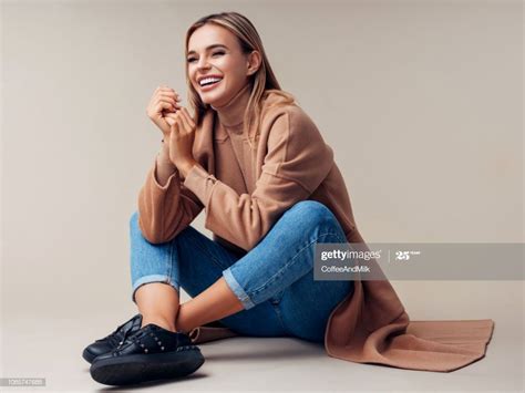 Smiling Woman Sitting On The Floor Sitting Pose Reference Sitting Poses Best Photo Poses