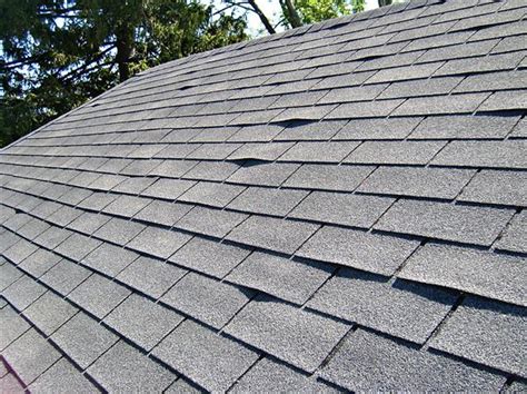 Residential Roofing And Curling Shingles