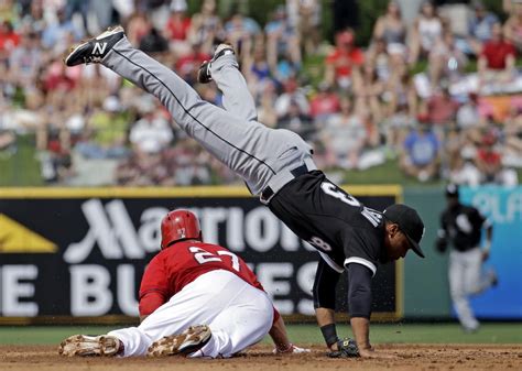 Los Angeles Angels Mike Trout Slides Safely Under Chicago White Soxs Micah Johnson As He