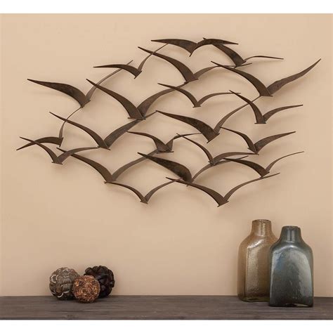 Large metal wall art for your modern living places. Litton Lane 47 in. x 26 in. Brown Iron Flying Birds Wall ...
