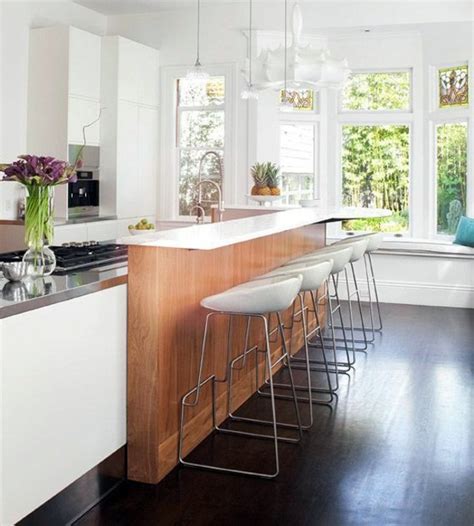 The waterfall countertop is a nice touch, turning an island into a buffet/bar combination. Set up your modern kitchen with a cooking island ...