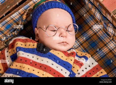 Caucasian Baby Wearing Spectacles Face Of Sleepy Child Stock Photo Alamy