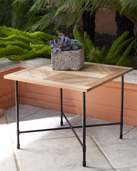 With their retro design, including slats and curved edges, these teak tables offer your space a classy, vintage vibe that isn't found with any. Avery Neoclassical Teak Outdoor Side Table | Neiman Marcus