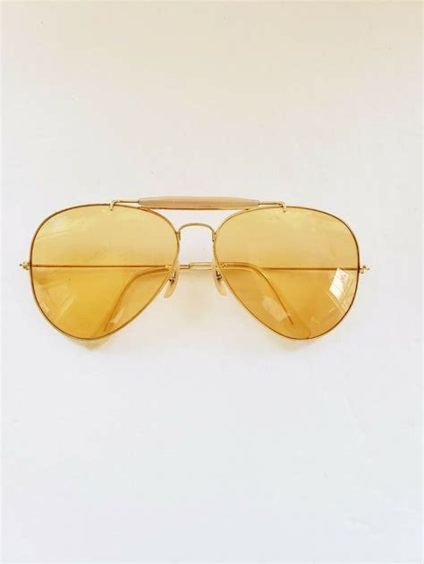 vintage 80s bausch lomb ray ban yellow lens gold shooters aviator sunglasses ray… yellow