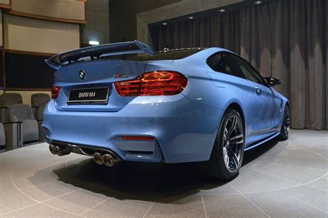 Bmw m4 competition coupé with m xdrive: Yas Marina Blue BMW M4 Coupe with racing wing