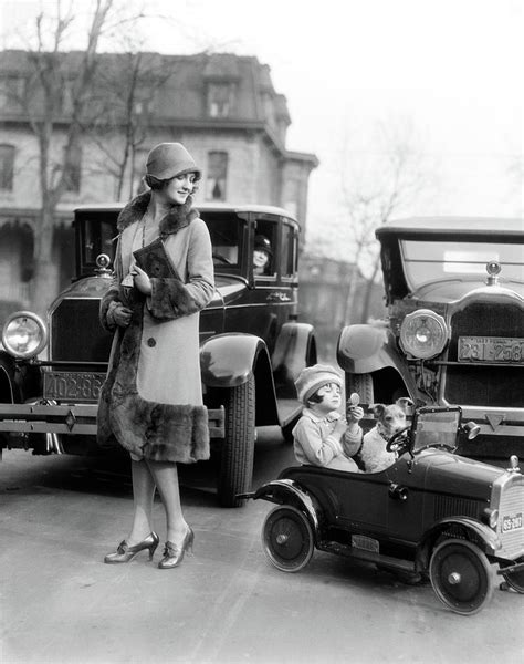 1920s Smiling Mother Watching Daughter Photograph By Vintage Images