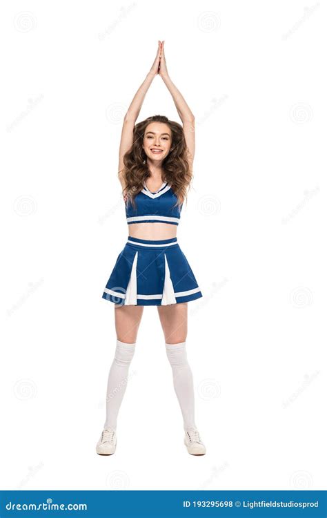 Vista De La Longitud De Una Alegre Chica Con Uniforme Azul Bailando Aislada En Blanco Foto De