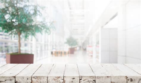 Wood Table Top On Blur Building Hall Background Stock Photo Image Of