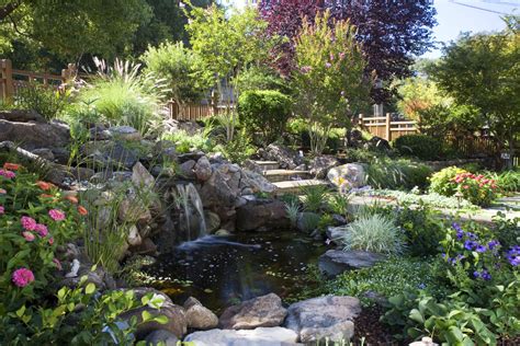 A backyard garden pond with running water, floating plants and darting fish can make a bland space breathtaking. Beautiful Garden Pond Waterfalls Design Ideas