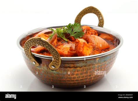 Indian Food Or Indian Curry In A Copper Brass Serving Bowl Stock Photo
