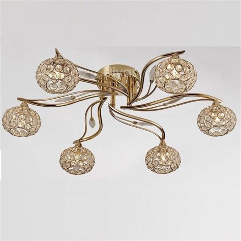 Striking geometric design scaled to work well over a dining or kitchen table, in a fo. Diyas Lighting IL30966 Leimo 6 Light French Gold Flush ...