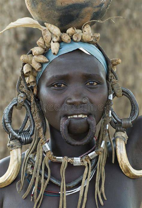 african mursi people 1 mursi woman in her village in mago national park south aff woman