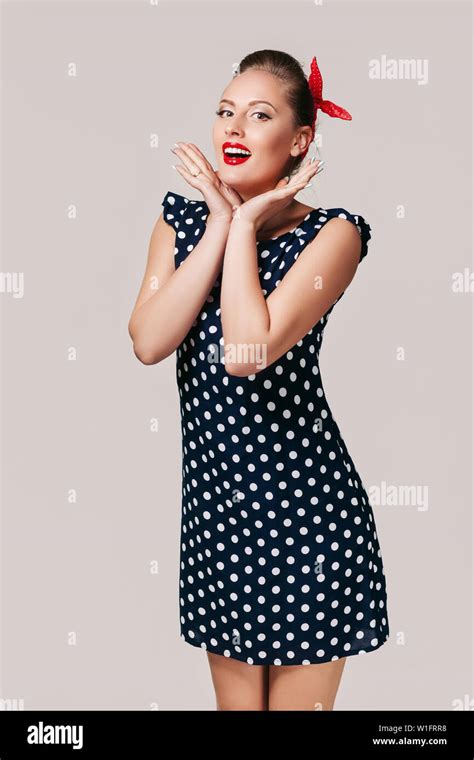 Portrait Of Surprised Pin Up Woman In Polka Dot Dress Cute Girl Posing In Retro Style Stock
