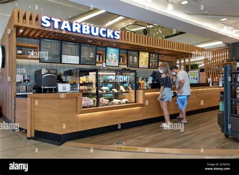 Starbucks Interior Counter Display With Customers 2J70H76 