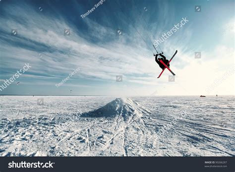 Ski Kiting And Jumping On A Frozen Lake Stock Photo