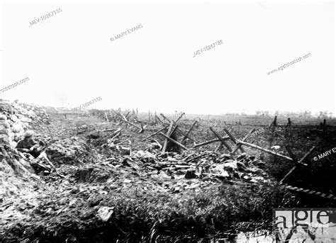 German First Line Trenches With Shells Bursting In The Distance Stock