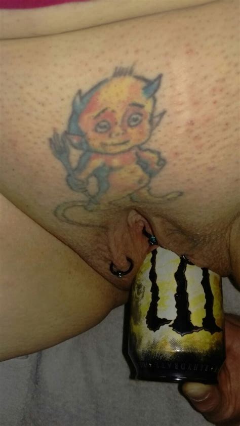 Tattooed Amateur Has A Can Inside Her Vagina