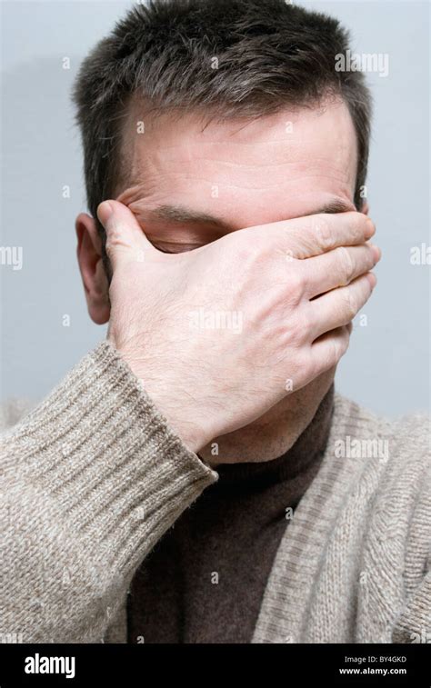 Man Hiding His Face Stock Photo Alamy