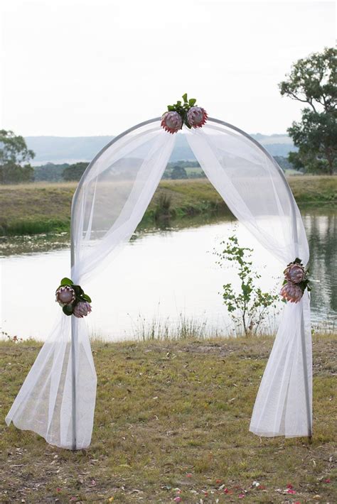 Fabulous Arch Ceremony Decorations Featuring King Protea Arch