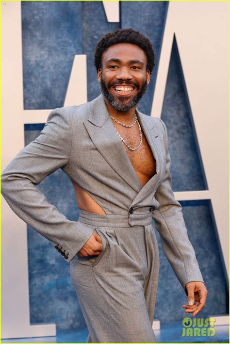 Donald Glover Rocks Cut Out Suit For Vanity Fair Oscar Party Photo