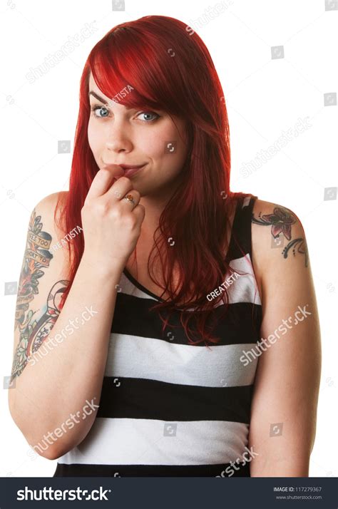 Bashful Young White Female With Red Hair And Tattoo On