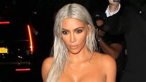 kim kardashian rocks platinum hair and skin tight dress for nyfw event 2017 new york fashion