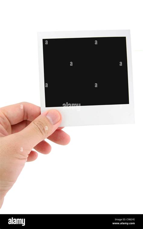 Hand Holding Polaroid Photo With White Background Stock Photo Alamy
