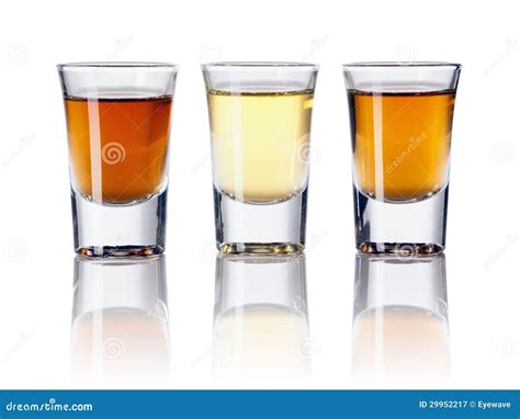 Three Kinds Of Alcoholic Drinks In Shot Glasses Royalty Free Stock