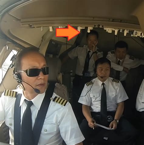 Two Air China Pilots Standing In The Cockpit During Takeoff - View from ...