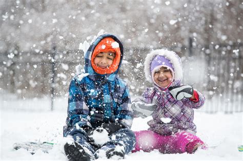 Little Children Enjoying Snowfall Stock Image Image Of