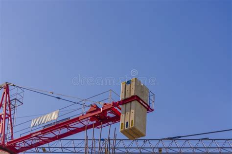 Scaffolding And Big Industrial Tower Cranes With Unfinished High Raised